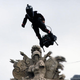 Illustration for article titled The French military is proud to unveil its very own hoverboard-riding, rifle-toting supervillain